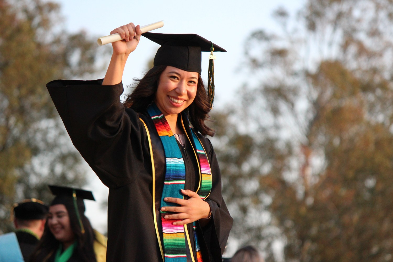 Graduate celebrating at a graduation ceremony